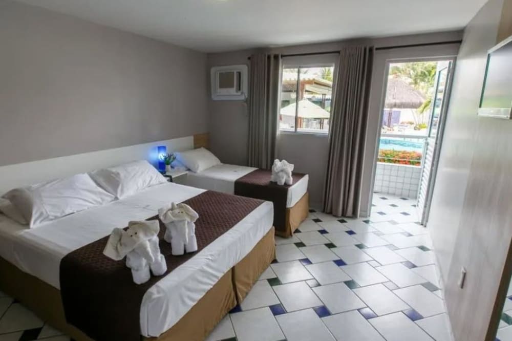 TRIPLE DELUXE ROOM WITH BALCONY