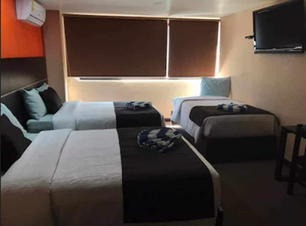 Triple Room, Multiple Beds photo 1