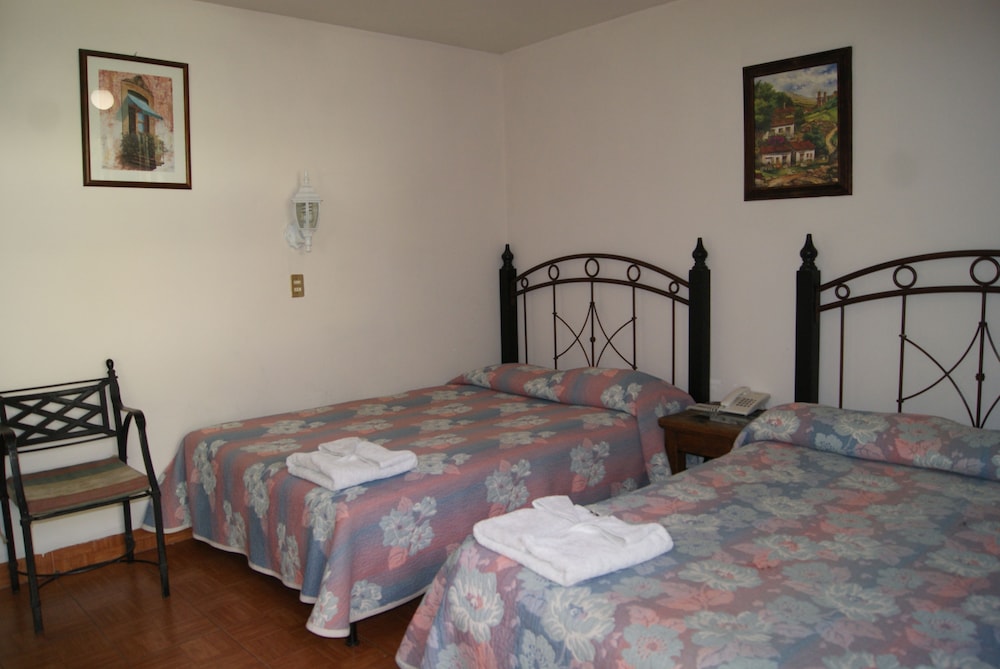 Standard Triple Room, 2 Double Beds photo 1