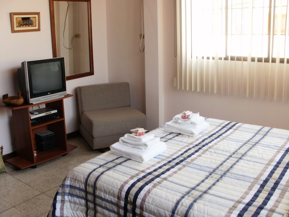 Classic Triple Room, 1 Queen Bed With Sofa Bed, Private Bathroom, Courtyard View photo 3