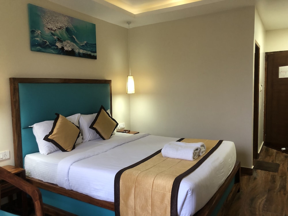 Deluxe Queen Room - Photo 7