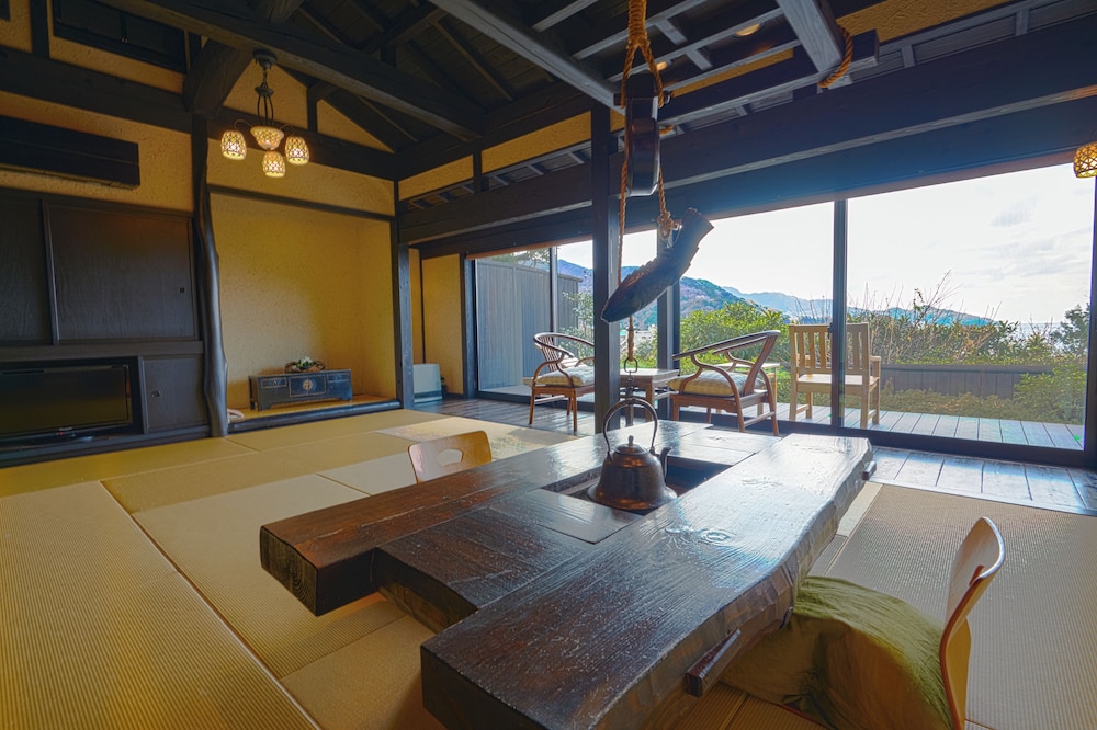 Twin Room with Tatami Area and Open-Air Hot Spring Bath, Sea View [KABURA], Non Smoking photo 1