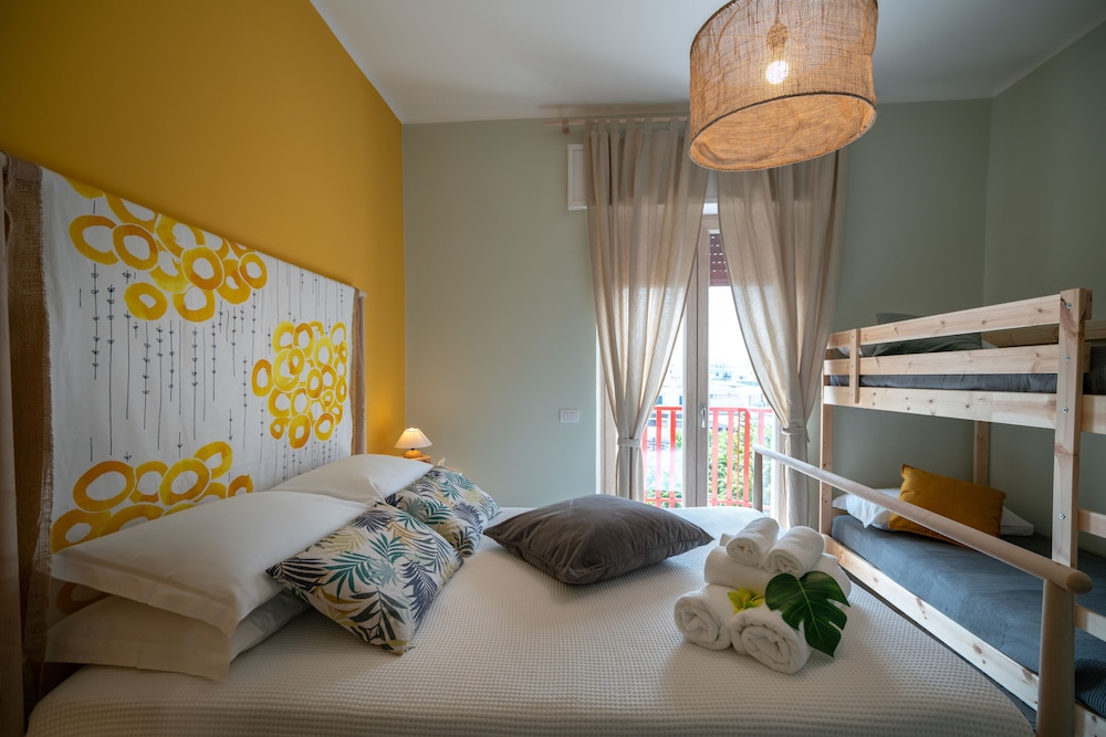 Premium Quadruple Room (Okra) photo 1