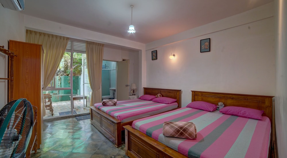 Family Quadruple Room, 2 Double Beds, Non Smoking, Garden Area photo 1
