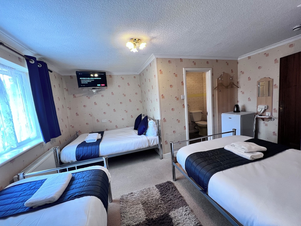Deluxe Quadruple Room, Multiple Beds photo 1