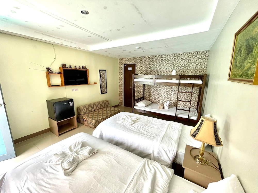 Standard Quadruple Room - Photo 8