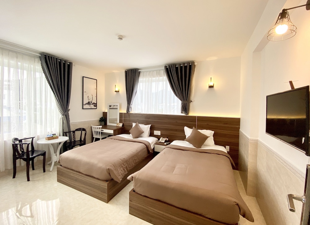 Standard Twin Room - Photo 1