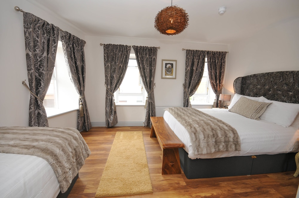 Deluxe Triple Room - Photo 1