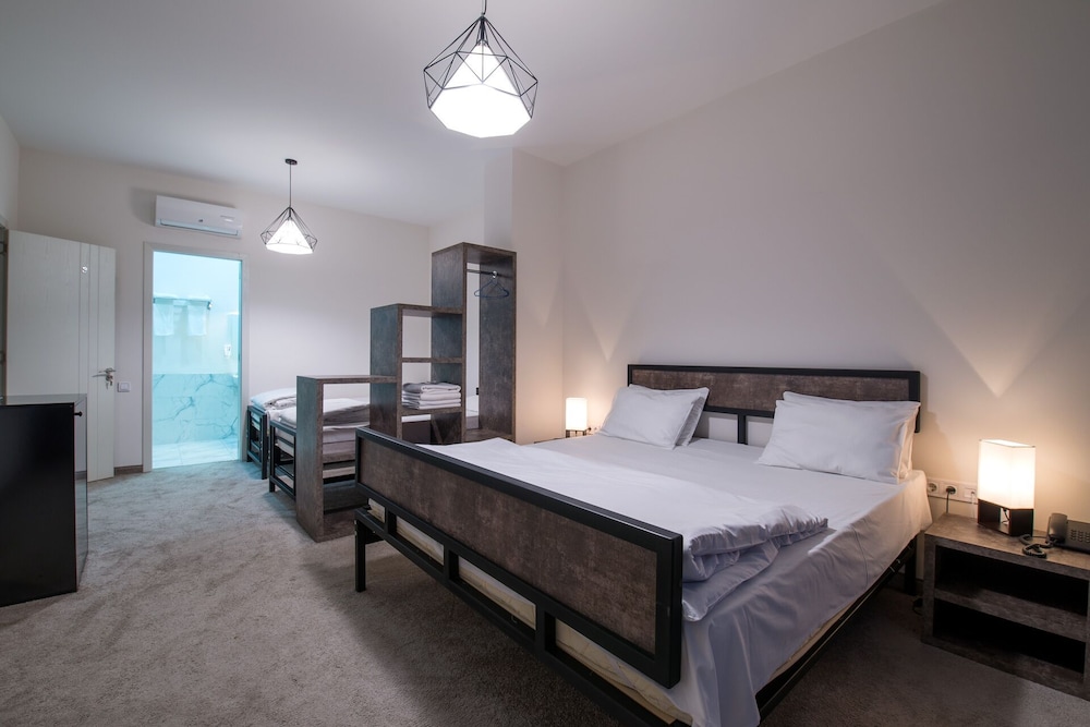 Family Quadruple Room, Multiple Beds, Private Bathroom photo 1