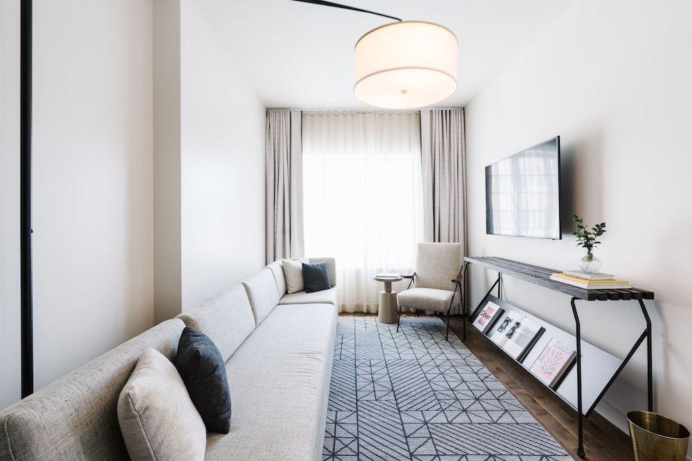 Design Suite, 1 King Bed with Sofa bed