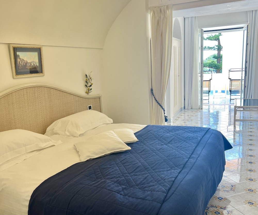 Suite Executive, letti multipli, patio, vista mare parziale (Executive patio partial seaview)