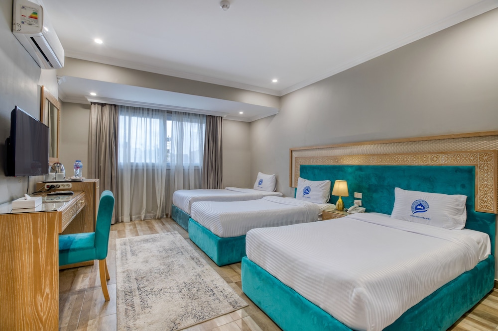 Economy Triple Room - Photo 1