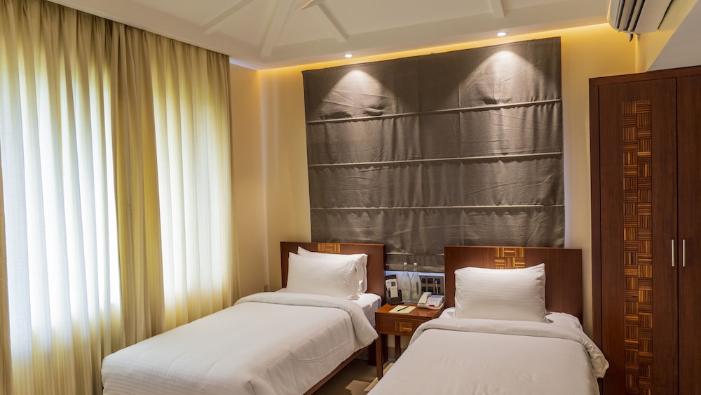 Premium Garden View Twin Room - Photo 1