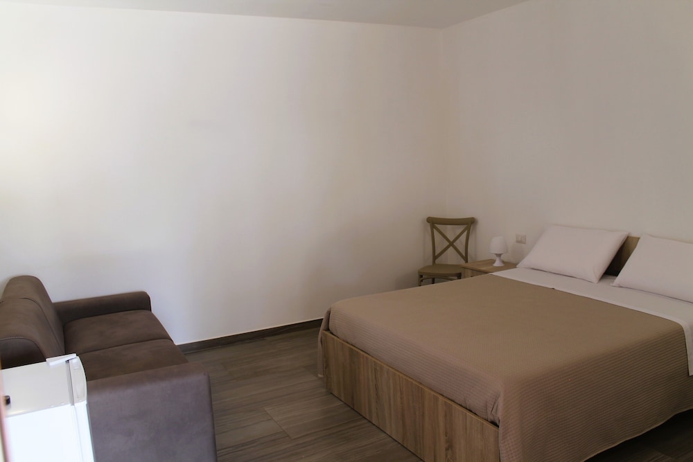Comfort Quadruple Room, Patio, Garden View