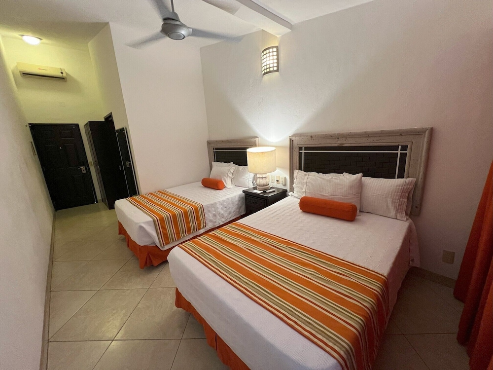 Habitación dos matrimoniales sin vista - tobogan