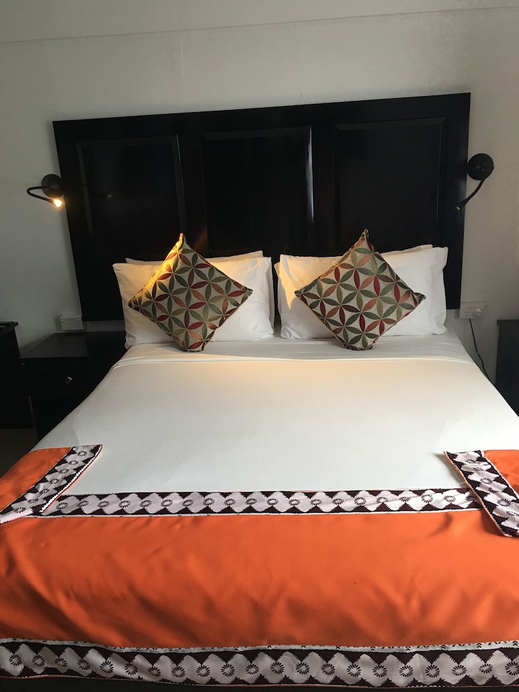 Deluxe Room, Multiple Beds, Courtyard View