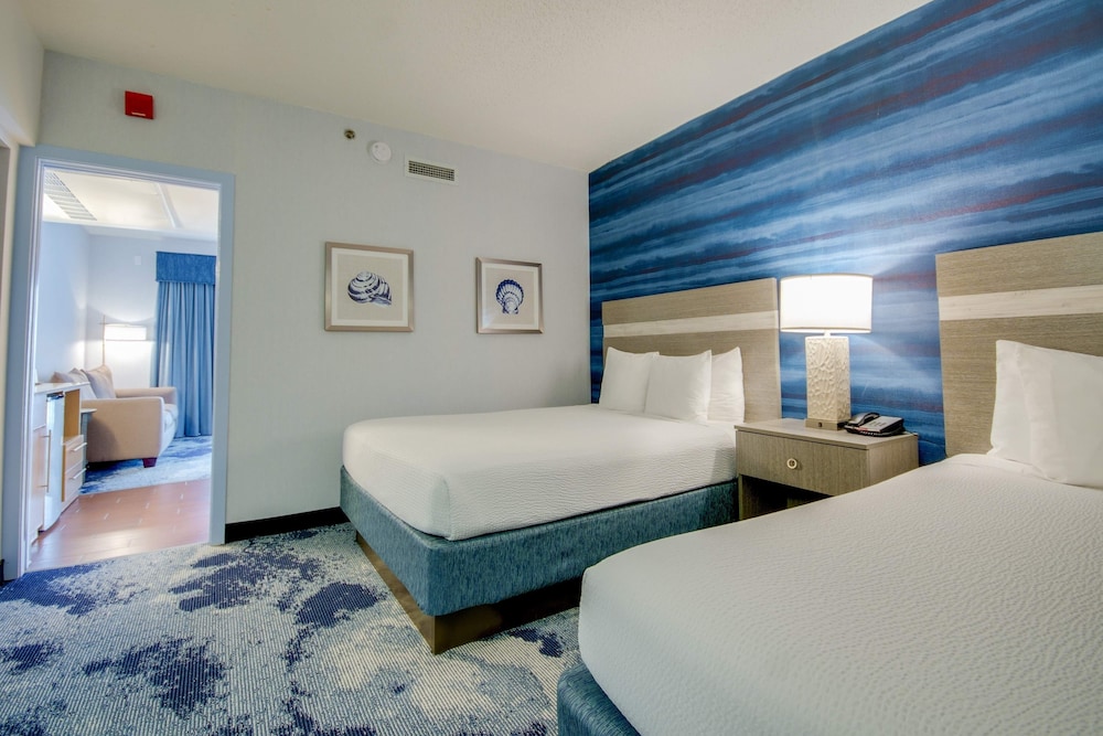 Suite South, 2 Queen Beds & Sofa Bed, Limited View, Balcony photo 1
