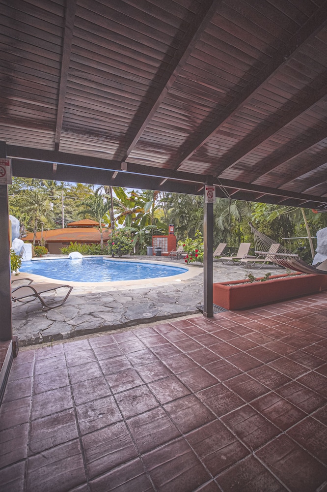 Quadruple Room, 2 Double Beds, Patio, Pool View photo 2