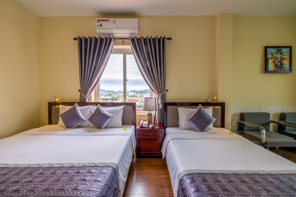 Deluxe Triple Room - Photo 9