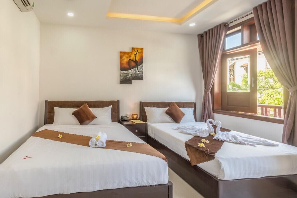 Deluxe Room - Photo 10