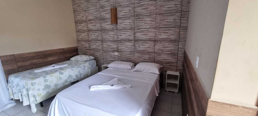 Suíte Quadruplo com vista piscina Andar Superior