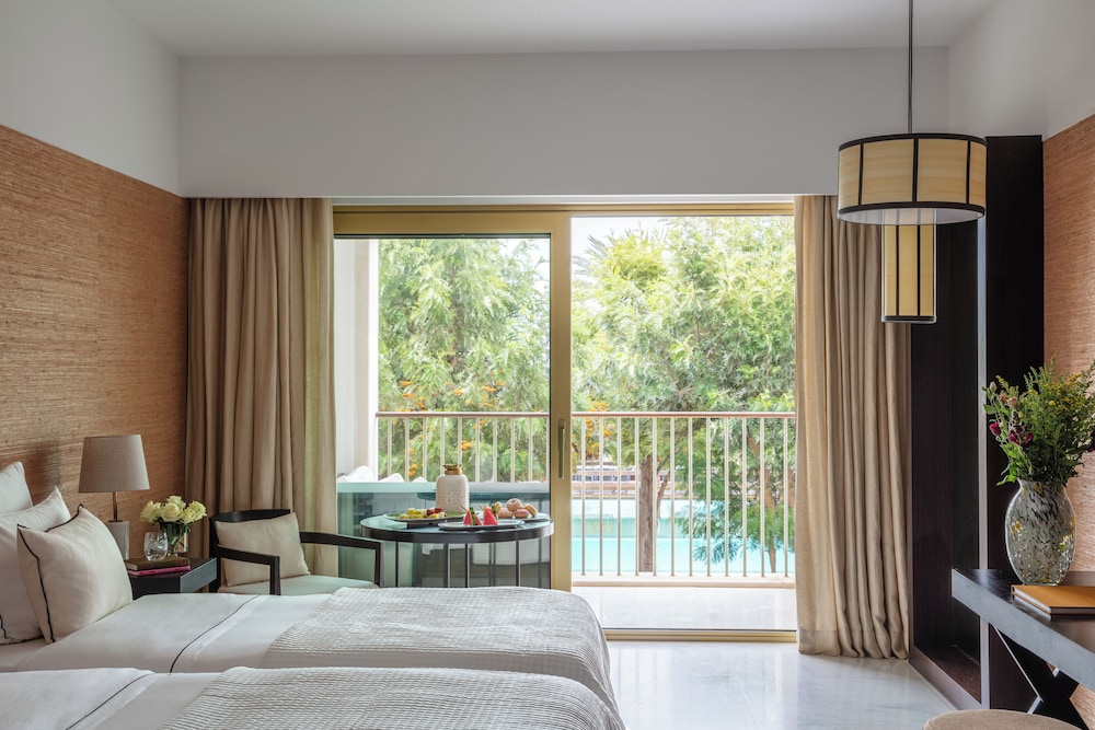 Deluxe Room, 2 Twin Beds, Balcony, Pool View - Photo 1