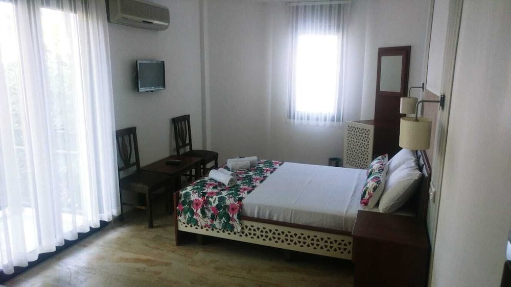 Family Triple Room, Multiple Beds, Garden View photo 1
