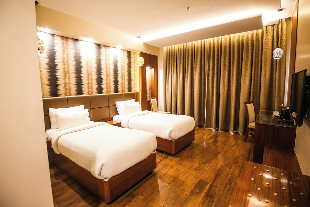 Deluxe Room - Photo 11