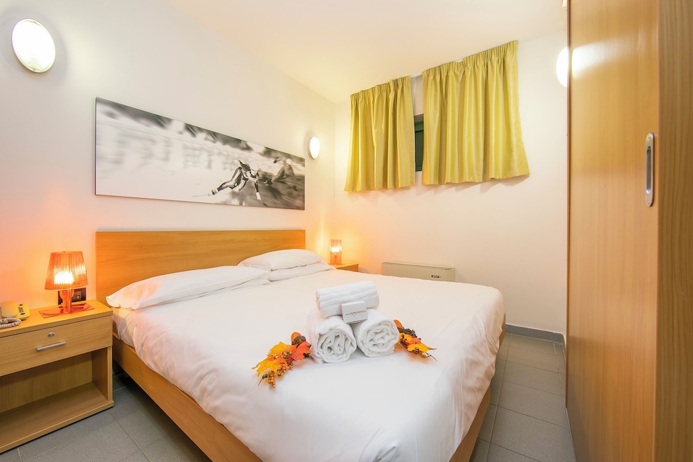 Family Apartment, Multiple Bedrooms (Teleo 106 Ski In - Ski Out 50m)