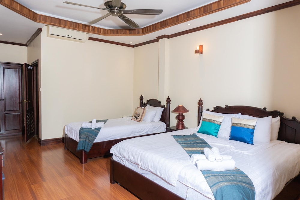 Deluxe Triple Room - Photo 23