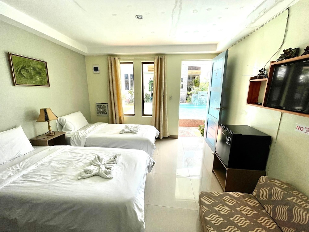 Standard Quadruple Room - Photo 9