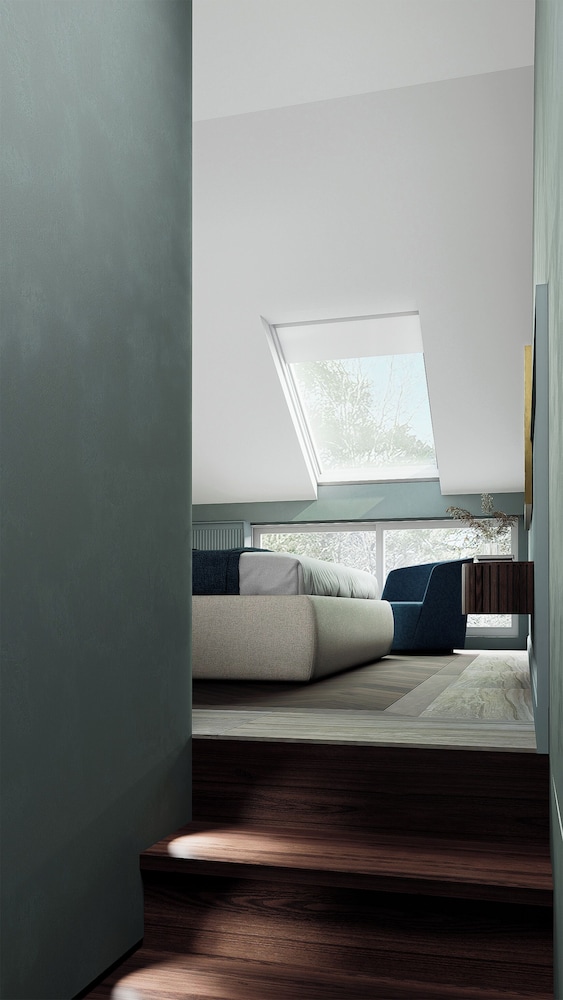 Junior Suite DUPLEX, con scala interna, e vista sulla piscina e sul lago