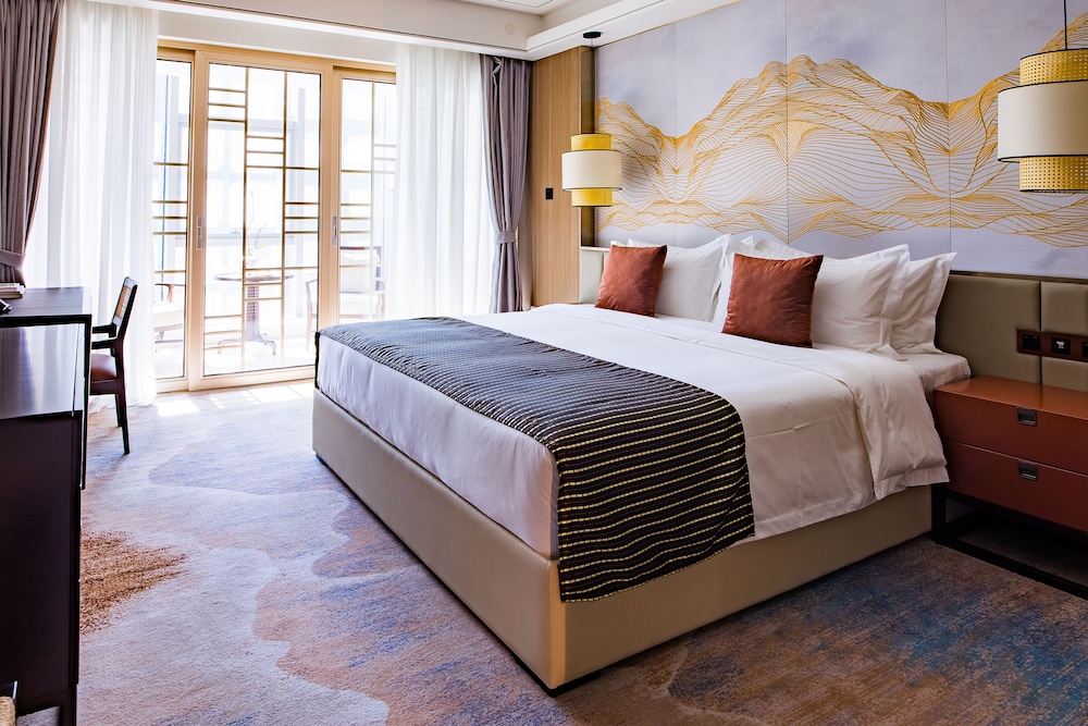 Deluxe Room - Photo 1