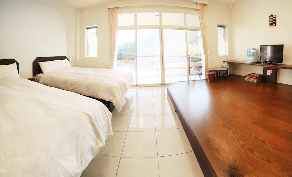 Comfort Quadruple Room, 2 Double Beds, Garden Area photo 1