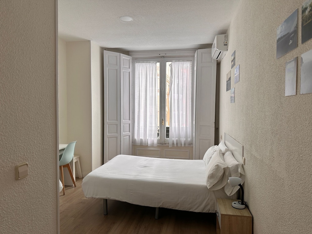 Habitación Triple Estándar, Múltiples Camas, No Fumar, Vista a la Ciudad