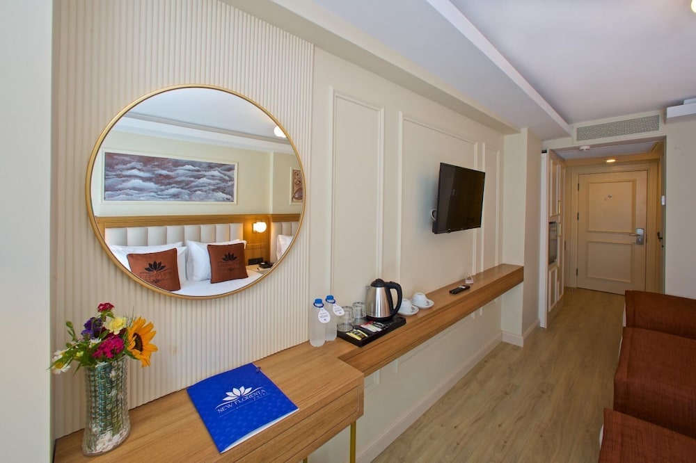 Deluxe Quadruple Room, Multiple Beds photo 3