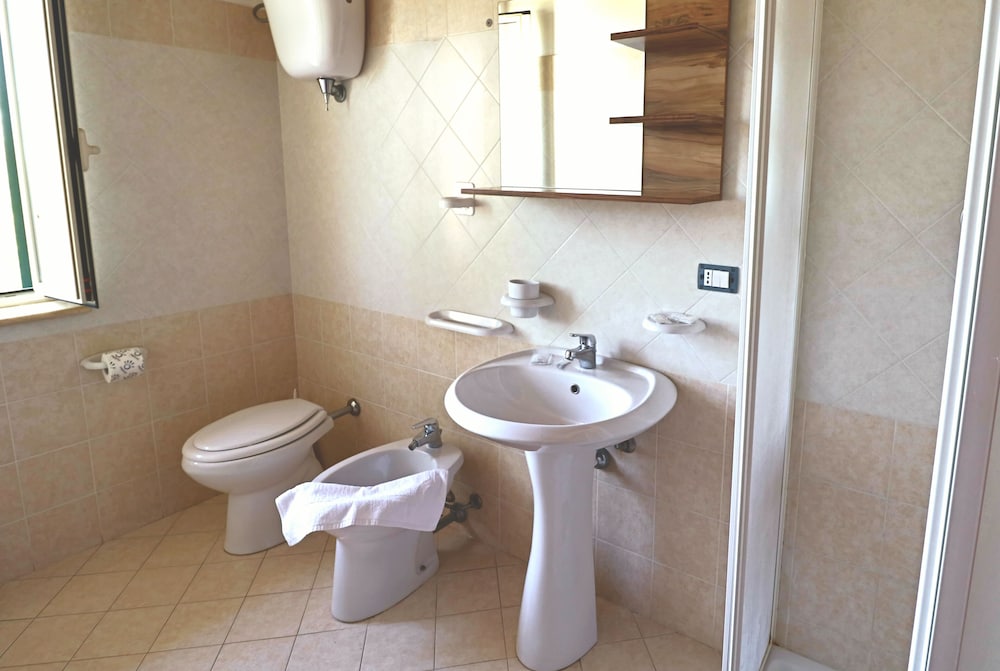 Basic Quadruple Room, 1 Bedroom, Private Bathroom, Garden Area photo 3