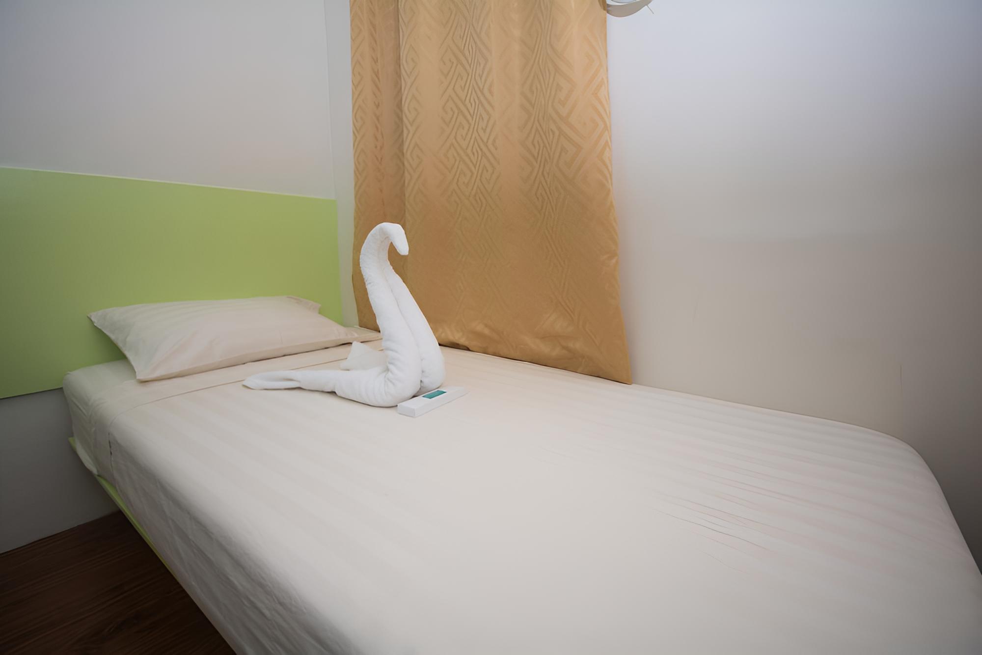 Deluxe Single Room with Private Bathroom photo 2