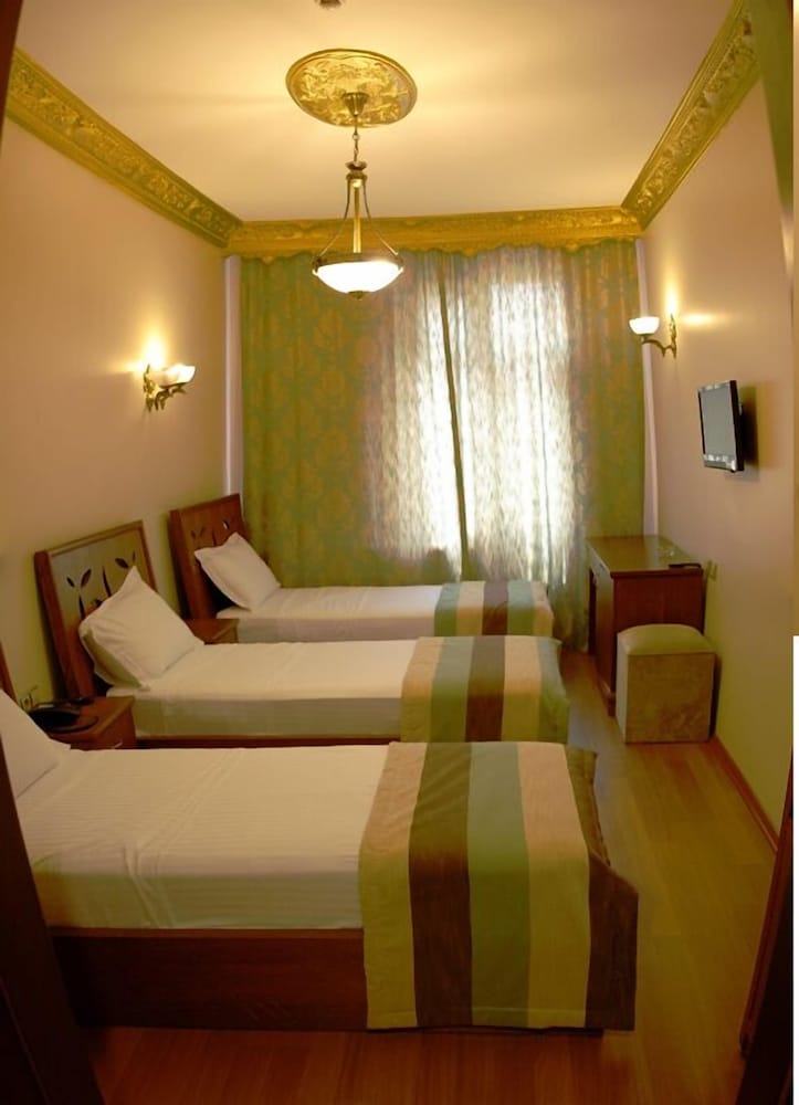 Standard Triple Room, City View photo 1