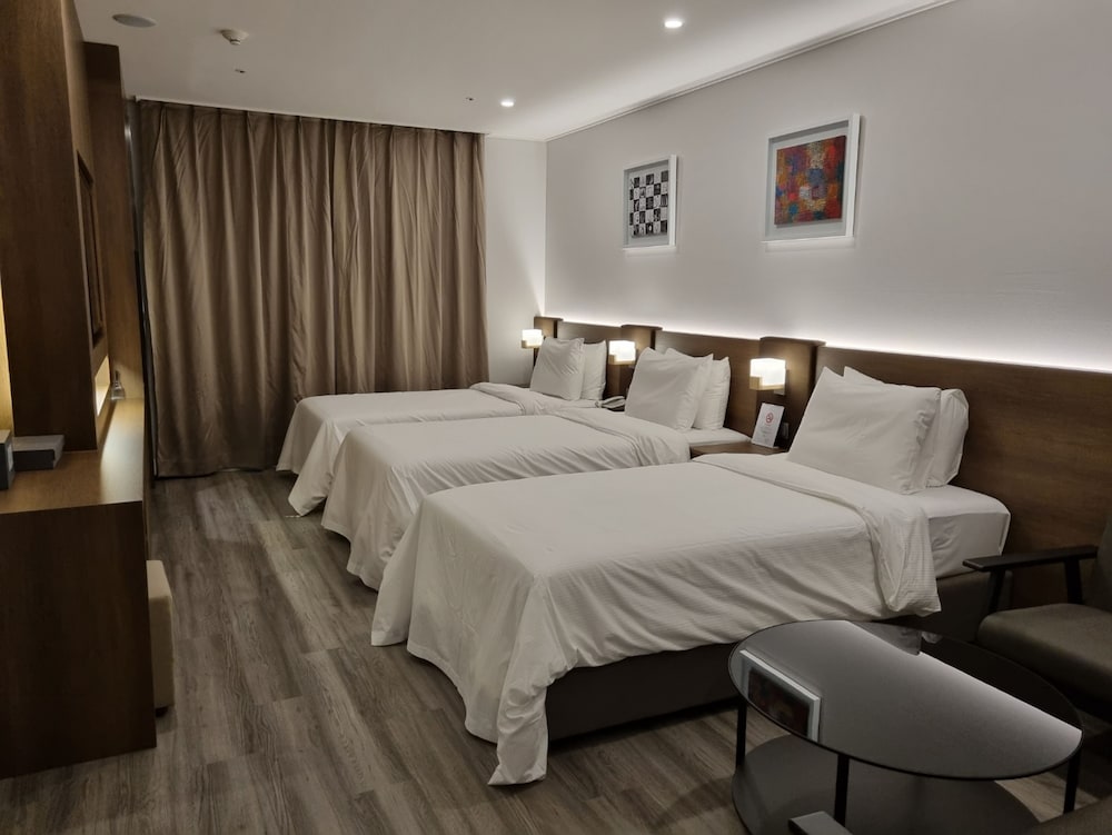 Deluxe Triple Room