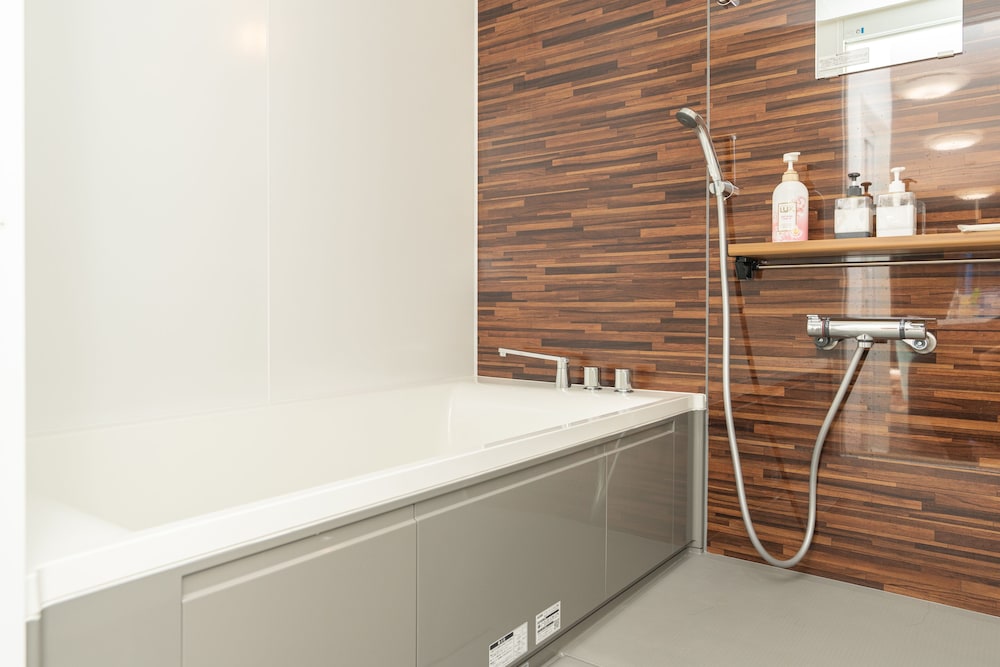 Family Studio, Multiple Beds, Bathtub, Partial Ocean View photo 2