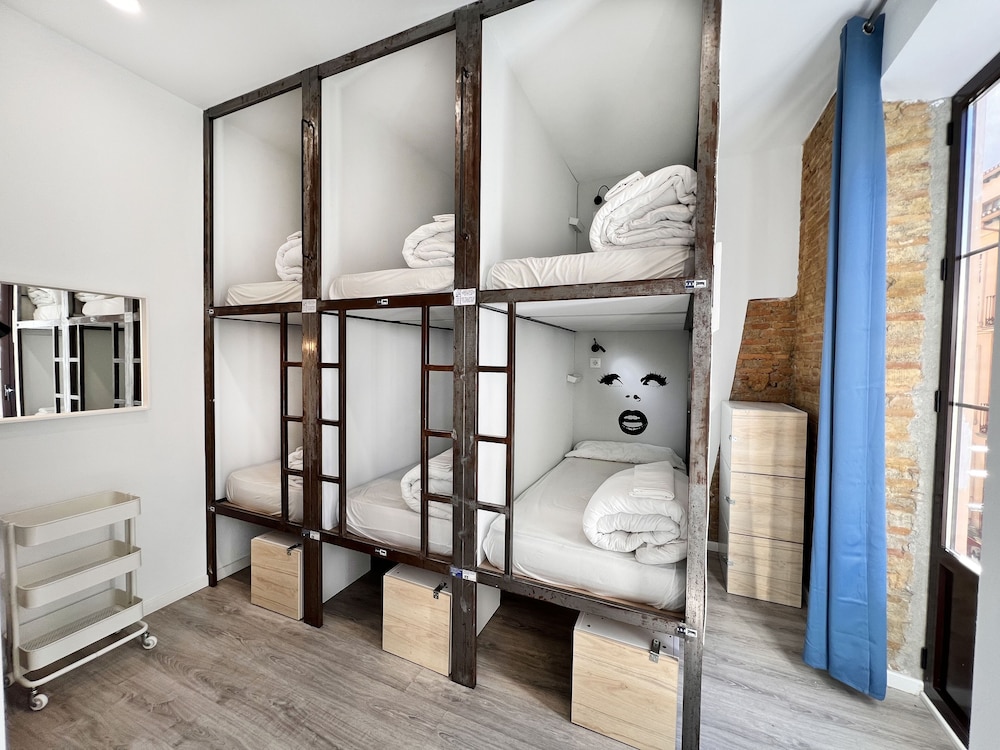 1 cama en dormitorio compartido para 6 personas