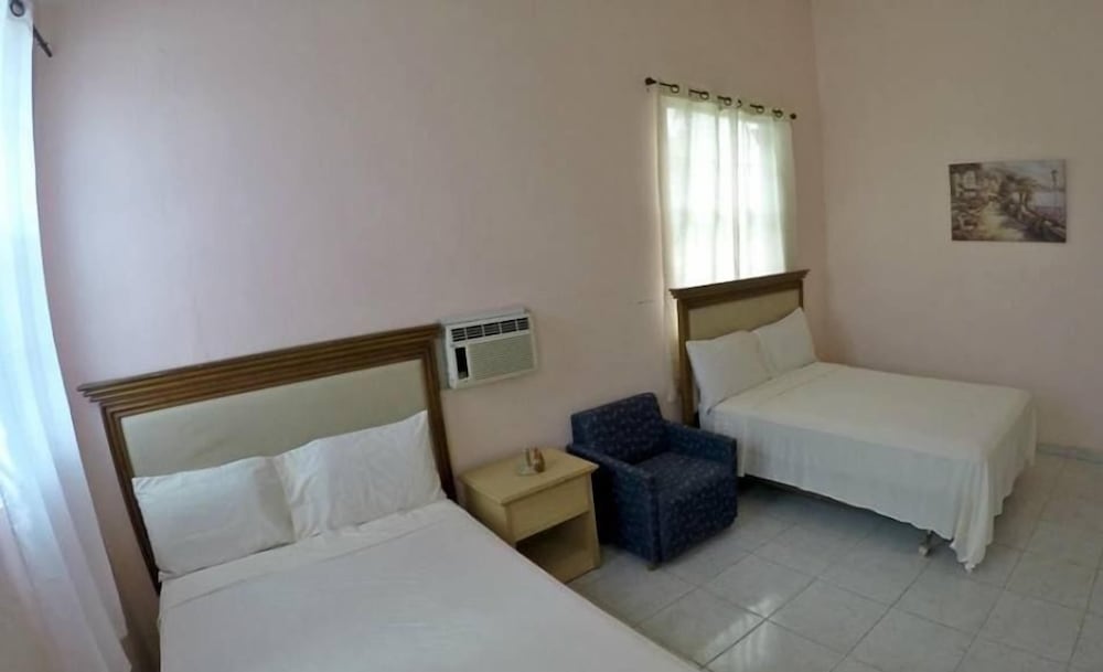 Standard Room, 2 Double Beds, Garden View photo 3