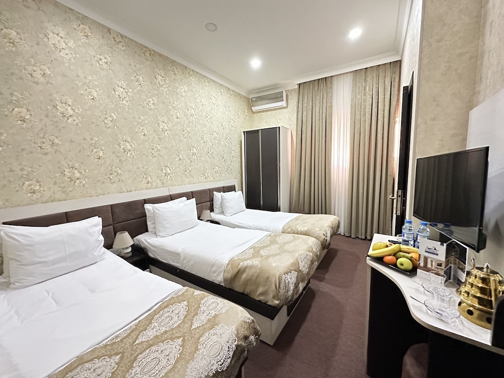 Elite Quadruple Room - Photo 4