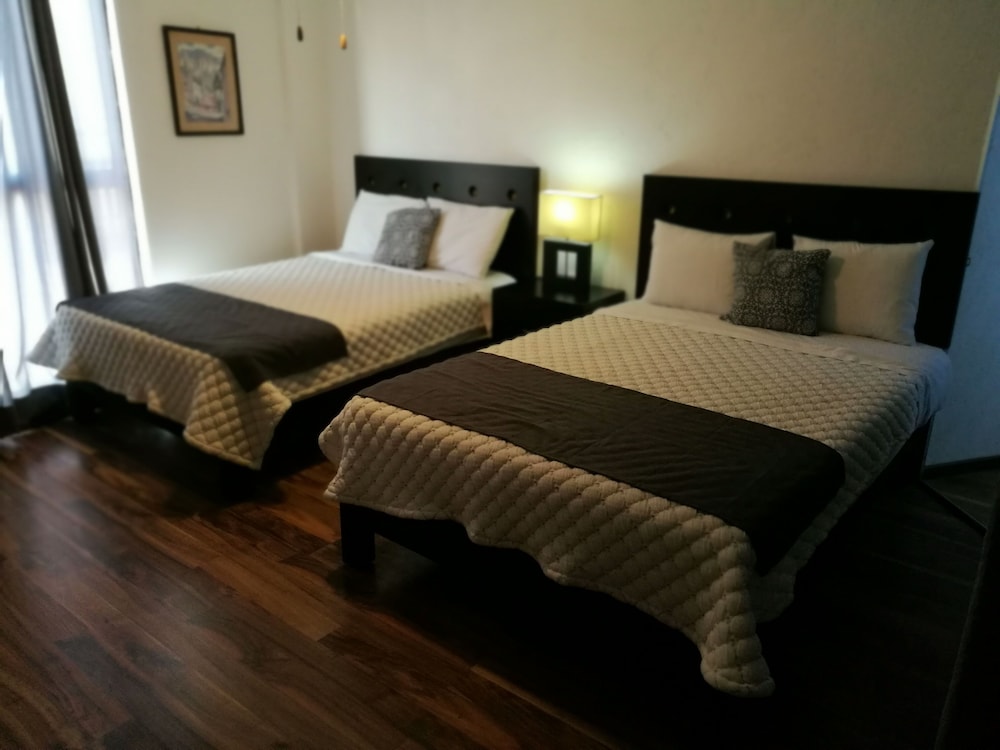 Economy Single Room, 2 Double Beds