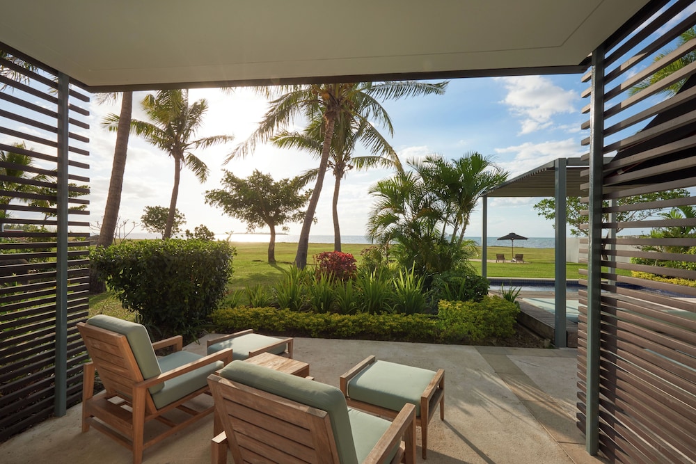 Deluxe Room, 1 Bedroom, Kitchenette, Beachfront (Laundry) - Photo 1