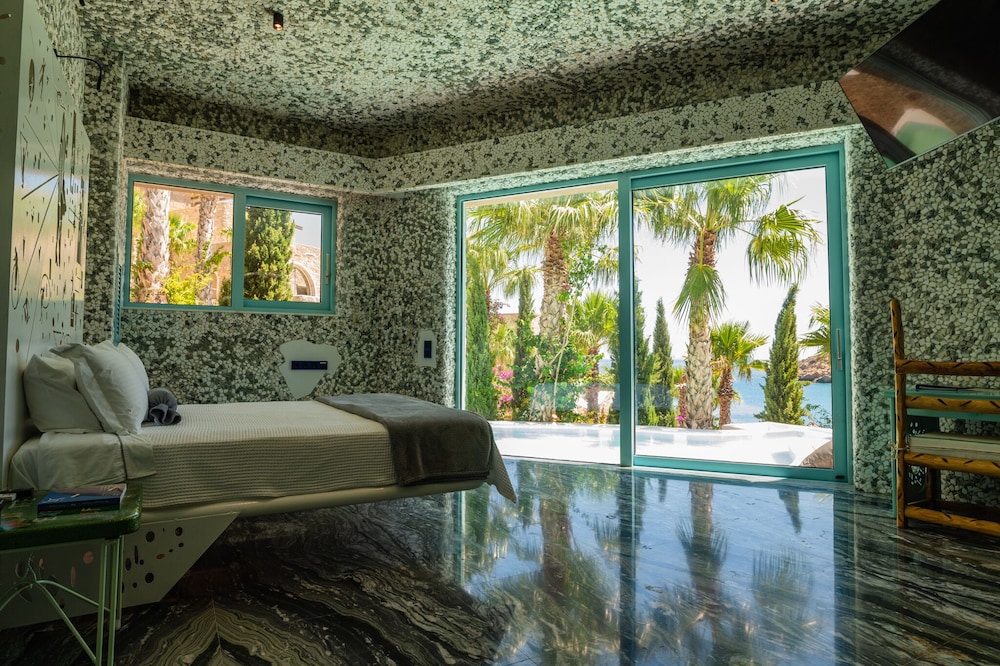 Suite mit Blick auf das Meer und den Teich
