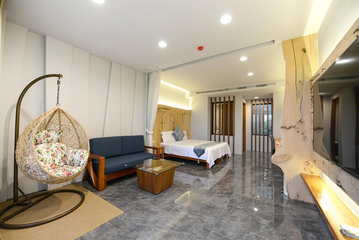 Garden View Deluxe Double Room with Bathtub - Photo 1
