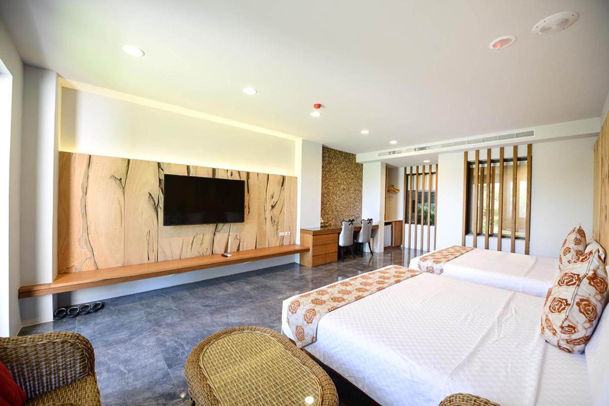 Garden View Deluxe Quadruple Room with Bathtub photo 3