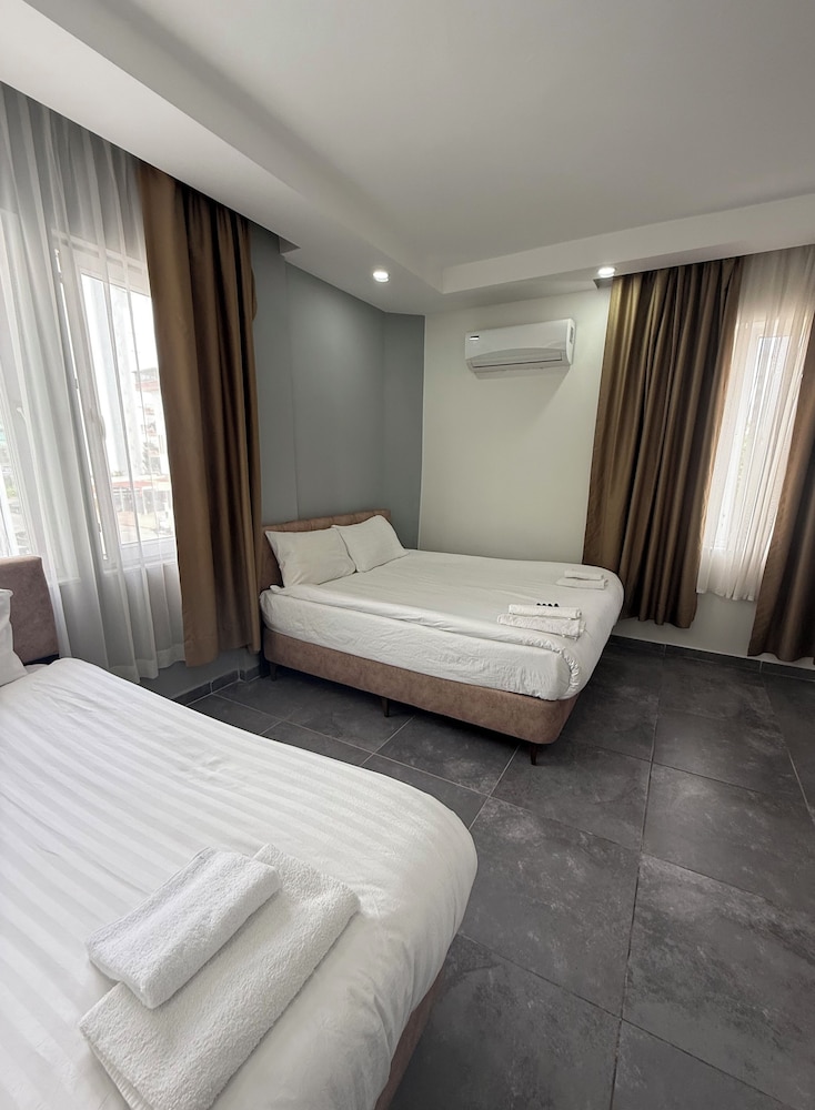 Standard Triple Room (without balcony) - Photo 7